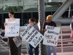 Abortionist cheerleaders gather outside of the convention.