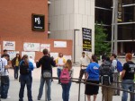 Ben "Sheepdog" Bloedorn (in the white and yellow shirt) preaches to a growing crowd of students at California State University Long Beach.