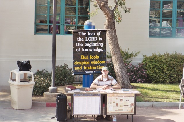 Michael at information table at Glendale Community College