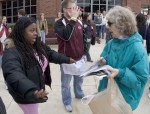 Linda speaks with student.