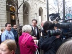 Media gathers for interviews after the dismissal of the charges.