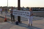 Randall and Linda Beckman hold sign for Phillies "Gay Day" attendees to see.