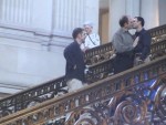Homosexuals kiss in San Francisco City Hall after false wedding.