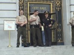 Sheriff deputies watch Repent America.