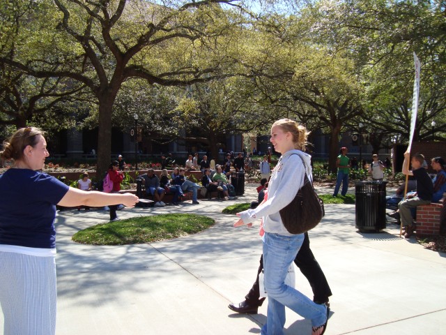 Shirley Carpenter passes out tracts at U of T.