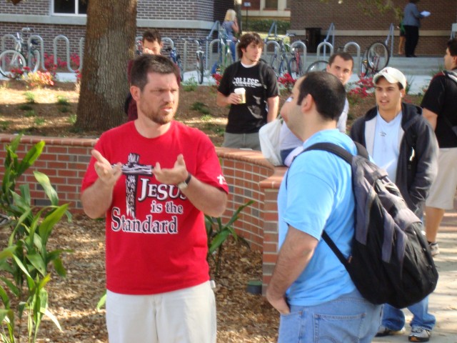 Rick Carpenter shares the gospel of Christ with a student at U of T.