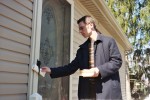 Nathan distributing invitations and Gospel tracts (one of thousands of homes that RA reached out to for the creation seminar)