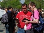 Tim Gruber (left) witnesses to a homosexual man at the event.