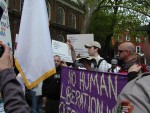 Michael preaching outside of the historic Christ Church as homosexuals attempt to block him.  Inside, false teachers assert that all faiths lead to heaven and that homosexual acts are not sinful.  Michael preaches (left) with attorney Scott Shields (right).